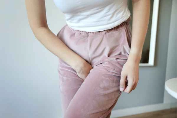 woman struggling with urine incontinence Ponders End
