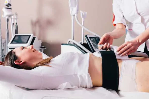 woman having body sculpting to help improve her body image and her mental health Ponders End